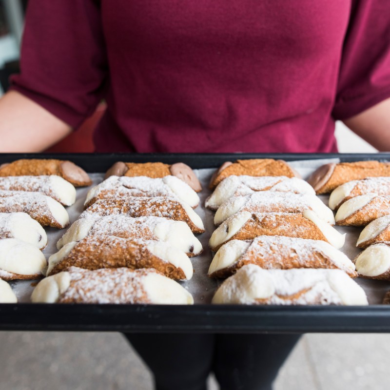 cannolis on tray